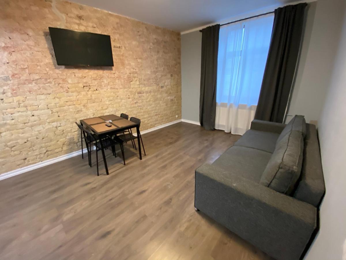 Aparthotel Rīga Exterior foto A living room in a typical apartment